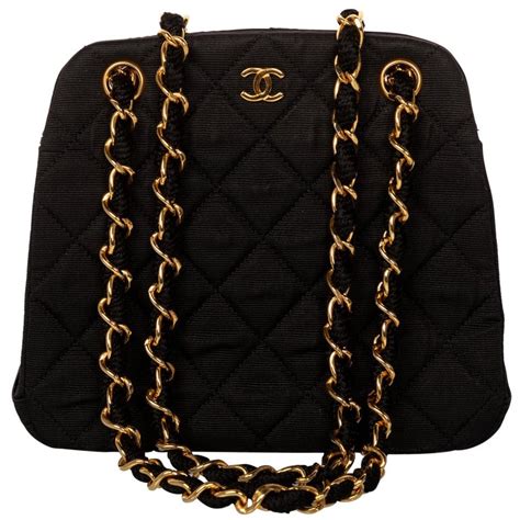 chanel handbag black and gold|chanel quilted bag gold chain.